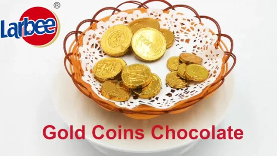 Cioccolatini dolci di alta qualità con monete d'oro in sacchetti per bambini
